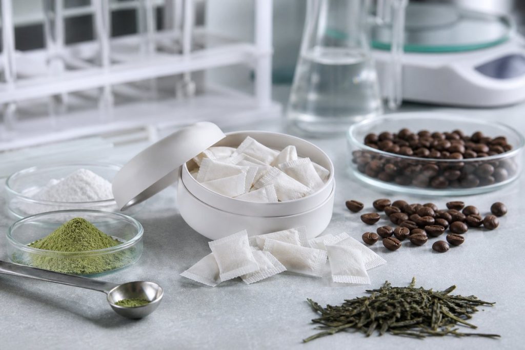 Caffeine and L-theanine oral pouch formulation with coffee and tea ingredients